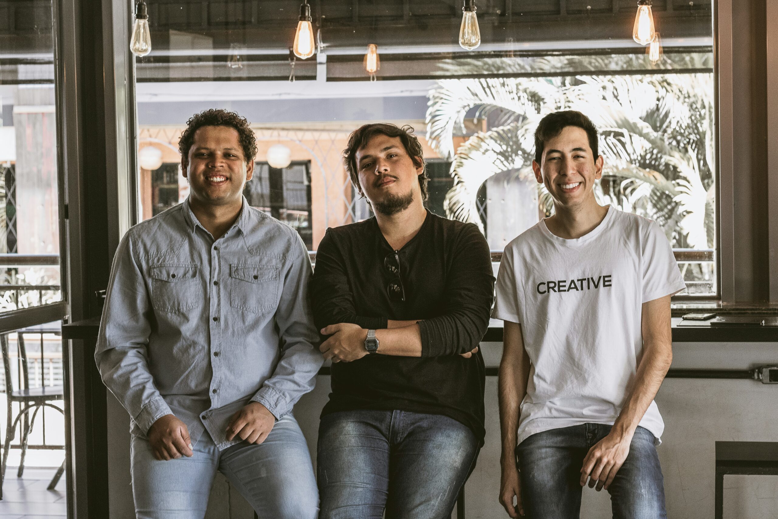 three entrepreneurs standing and smilling mental health services